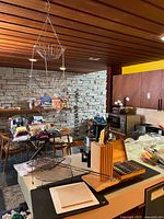 Overview showing knife block, boxed steak set, cutting boards, grill racks and hanging basket