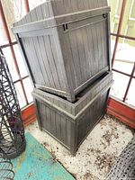 Two stacked resin storage cube tables showing exterior