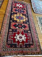 Full view of Persian runner rug on floor