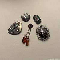 All five jewellery pieces laid out