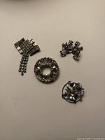 All five jewellery pieces laid out