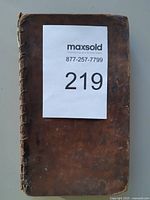 Front cover showing leather binding and stitching