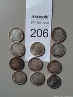 Obverse view of all 11 coins showing Queen Elizabeth II portraits.