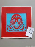 Front view of clown print showing full image and scale marker