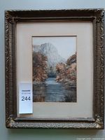Full view of framed watercolour with auction tag visible