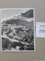 Front view of the black-and-white aerial photograph showing estate and shoreline