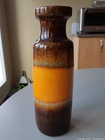 Full view of vase front showing glaze colors and shape