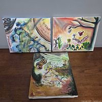 All three paintings displayed to show size and style