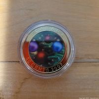 Reverse of lenticular coin showing ornament design and 50 CENTS 2007 legend