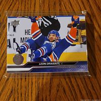 Front example card showing Leon Draisaitl in sleeve