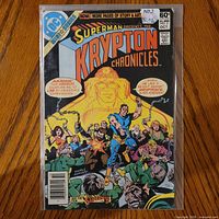 Front cover showing title, issue number, price, month, protective sleeve