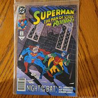 Front cover of Superman: The Man of Steel #14 comic in bag