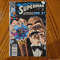 Front cover of Superman #51 in protective sleeve