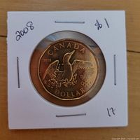 Reverse of 2008 Canadian Olympic dollar in holder