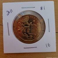 Reverse of 2011 Parks Canada commemorative dollar in flip