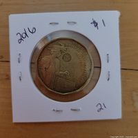 Reverse of 2016 Women’s Right to Vote Canadian loonie in flip