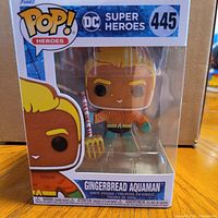 Front view of boxed Funko Pop Gingerbread Aquaman 445