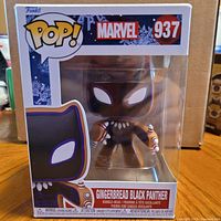Front view of boxed Funko Pop Gingerbread Black Panther 937