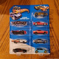 Front view of sealed Hot Wheels 9-pack showing all nine cars in package