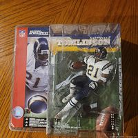 Front of sealed package showing figure and branding