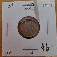 Front of 1941 Newfoundland 5 cents coin in flip