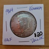Obverse of 1964 Kennedy half dollar in 2×2 holder