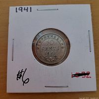 Reverse side of 1941 Newfoundland 10 cent coin in holder