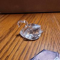 Faceted crystal swan side view