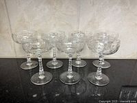 Set of eight matching crystal stem glasses
