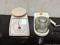 Overall view of both items: scale and chopper