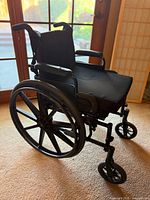 Full side view of black Medline manual wheelchair