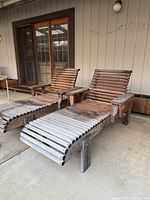 Both wooden chaise loungers, front view