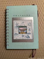 Front cover showing title Traveler and design