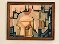 Full view of framed abstract painting on wall