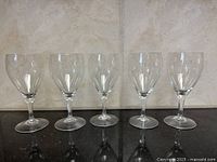 Front view of five Waterford Siren wine glasses