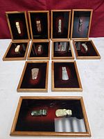 All 11 framed shadow boxes displayed