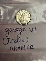 Reverse side showing Bluenose schooner and CANADA 10 CENTS legend