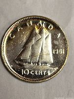 Reverse of 1951 Canadian dime showing Bluenose schooner and denomination