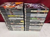 Two stacks showing full collection of game spines
