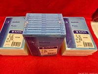 Stacks of Blueline D32 invoice books, sealed