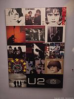 Full view of the U2 album collage poster