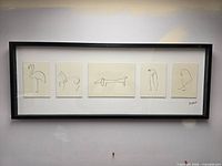 Front view of full frame with five prints