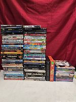 Front view two tall stacks and one small stack of DVD/Blu-ray cases