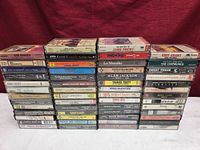 Four stacked rows of cassettes showing variety and quantity