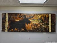 Front view of painted moose landscape on wood panel
