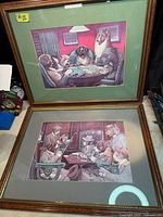 Both framed prints side by side showing frames, mats and subject matter