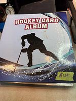 Front cover of blue Hockey Card Album