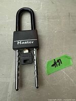 Front view of Master padlock with key