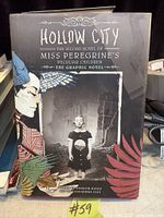 Front cover of "Hollow City" graphic novel hardcover showing title, subtitle, author and artist