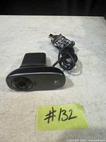 Front view of Logitech HD webcam with USB cable visible